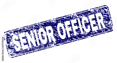 SENIOR OFFICER stamp seal print with grunge style. Seal shape is a rounded rectangle with frame. Blue vector rubber print of SENIOR OFFICER label with unclean style.
