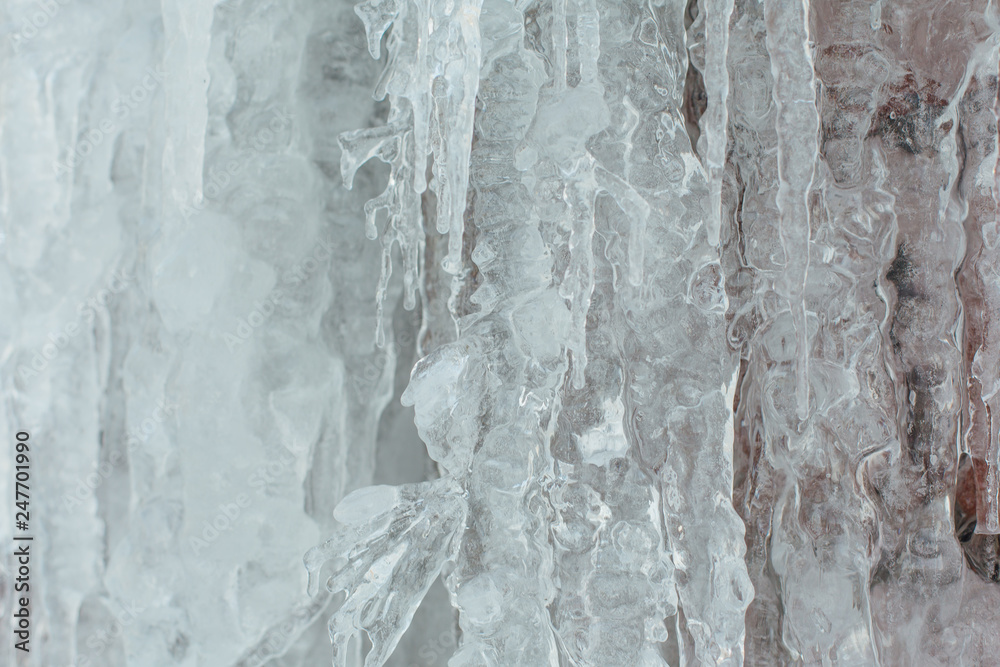 Very large and dangerous icicles close up Very large and dangerous icicles close up