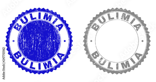 Grunge BULIMIA stamp seals isolated on a white background. Rosette seals with grunge texture in blue and grey colors. Vector rubber imitation of BULIMIA label inside round rosette.