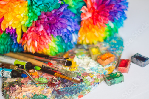 Wallpaper Mural multi-colored chrysanthemums on the palette with paints and brushes of the artist Torontodigital.ca