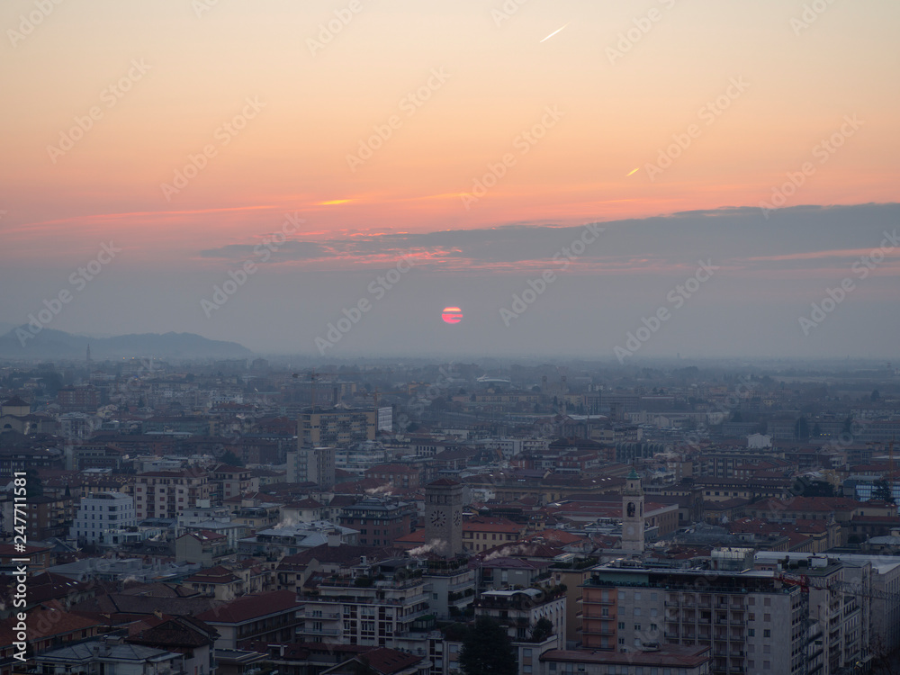 Bergamo, Italy. Landscape to the new city (downtown) at the sunrise from the old town located on the top of the hill