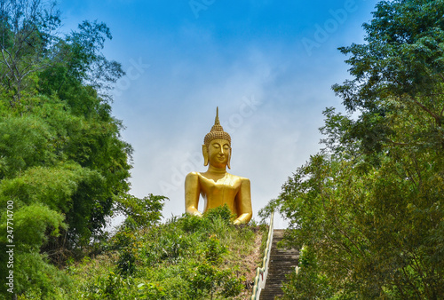 Photography The big golden buddha statue on hill in the temple on mountain thailand - religi
