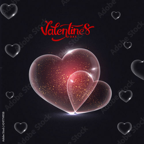 Shiny transparent heart shapes on black background with stylish lettering of Valentine's Day. photo