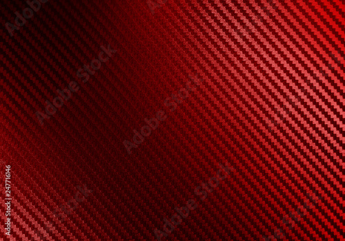 Metallic shiny texture of red carbon fiber self-adhesive paper. Material for racing car modification. Material design for background, wallpaper, graphic design