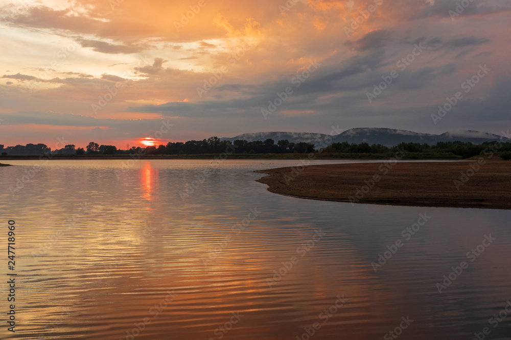 Sunset on a lake in Hohenrode in Germany