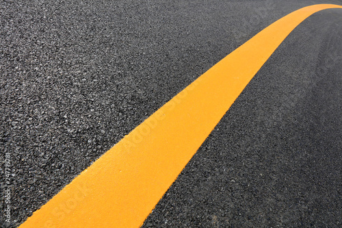 yellow line on the asphalt highway © YuanGeng