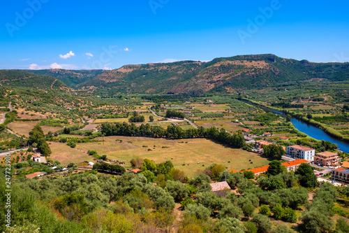 Sardinia  Italy - Panoramic view of the hills surrounding the town of Bosa by the Temo river seen from Malaspina Castle hill - known also as Castle of Serravalle