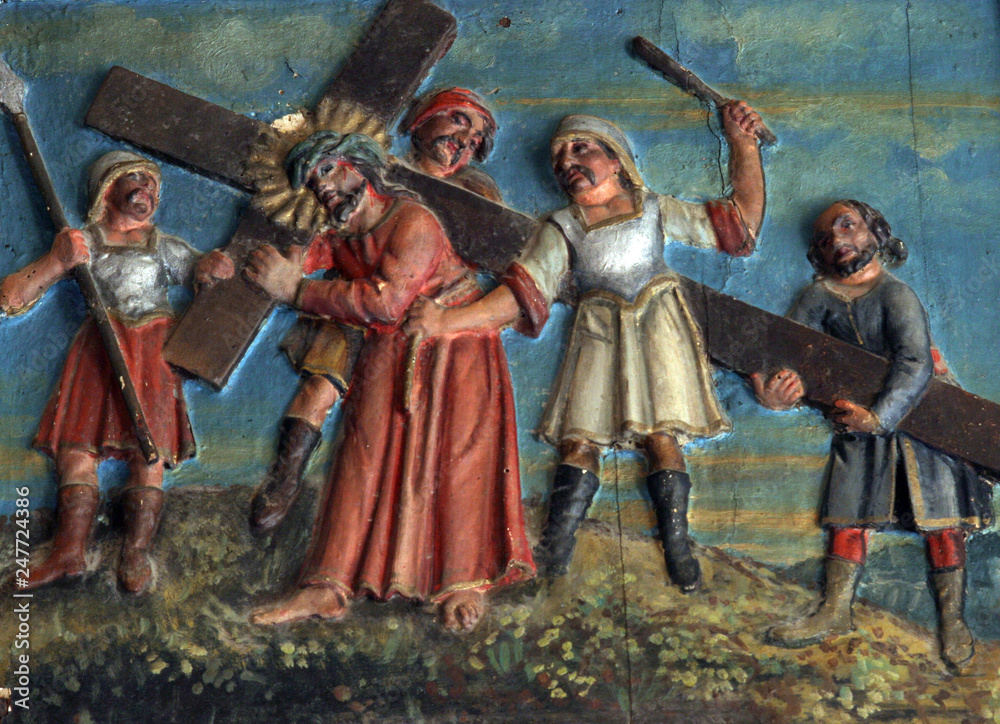 Fototapeta premium Simon of Cyrene carries the cross
