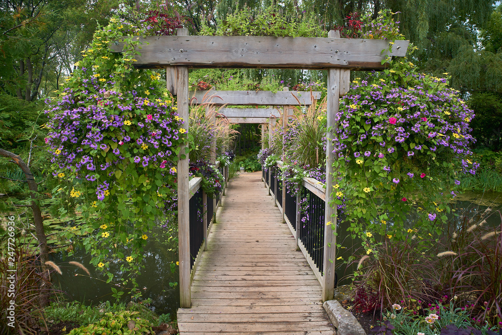Walkway through spring flowers at Montreal, Canada Walkway through spring flowers at Montreal, Canada