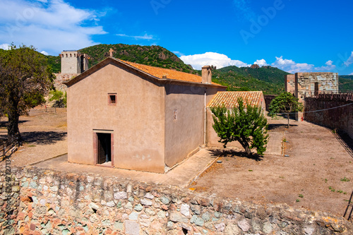 Bosa, Sardinia, Italy - The palatine chapel of Malaspina Castle, Castle of Serravalle, known as Church of Our Lady de sos Regnos Altos with the fortress inner courtyard