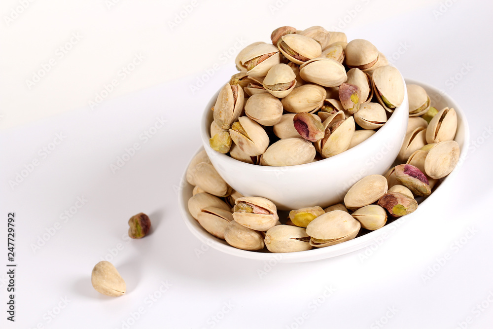 pistachios on a white background pistachios on a white background