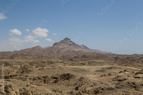 High mountain peak or dschebel between Sadah and Mirbat at the coastline of the Dhofar region of the Sultanate of Oman
