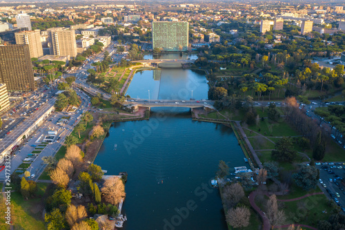 Aerial view of the modern EUR district in Rome, built for the Universal Exposition that should have been held in the Capital in 1942. In the foreground the small lake and the neighborhood park