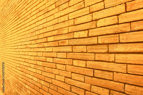 Gold yellow brick wall texture in seamless patterns abstract for horizontal colorful background