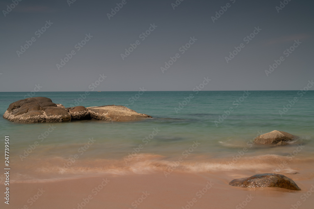 Waves breaking on the shore, in the Andaman Sea Waves breaking on the shore, in the Andaman Sea