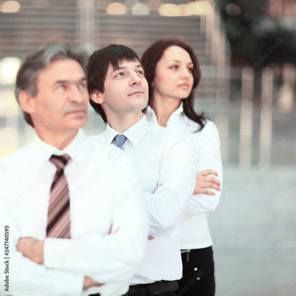 in full growth. portrait of confident business team in the office. in full growth. portrait of confident business team in the office.