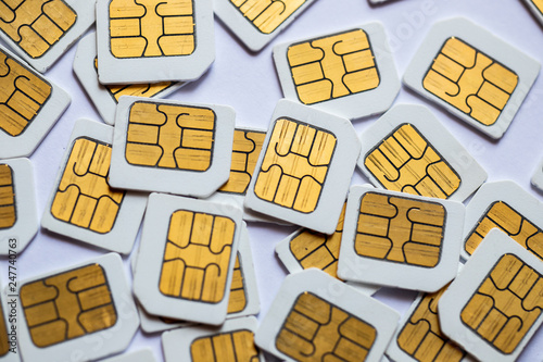 Many Micro SIM 3G for mobile over on white background. photo