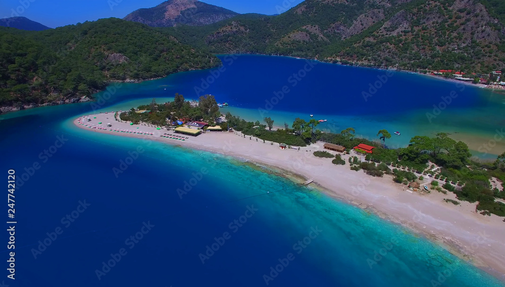 Sea (Oludeniz), Situated on Turkey of south-west coast, with it's pristine white beaches and amazingly blue waters,(Babadag) Sea (Oludeniz), Situated on Turkey of south-west coast, with it's pristine white beaches and amazingly blue waters,(Babadag)