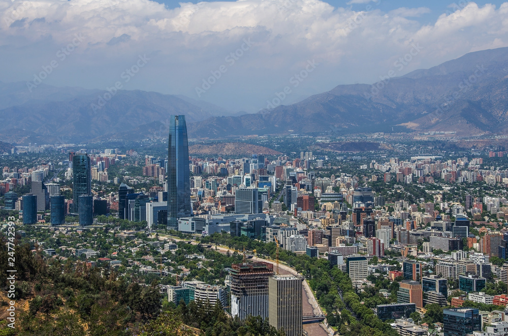Aerial view of a city and The Andes mountain in the background, Santiago, Chile