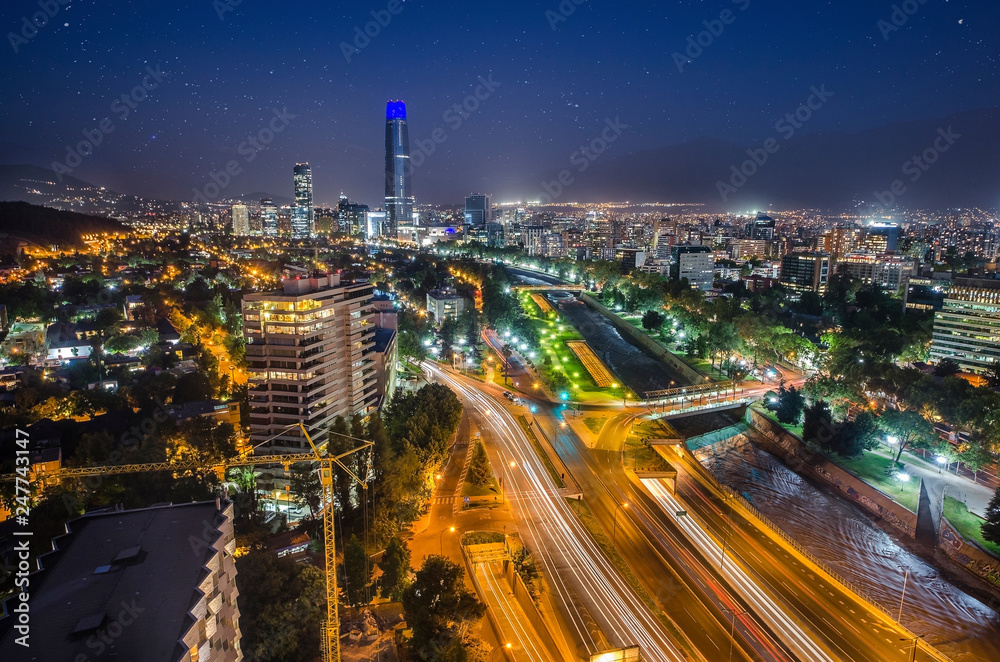 Night view of Santiago de Chile toward the east part of the city, showing the Mapocho river and Providencia and Las Condes districts