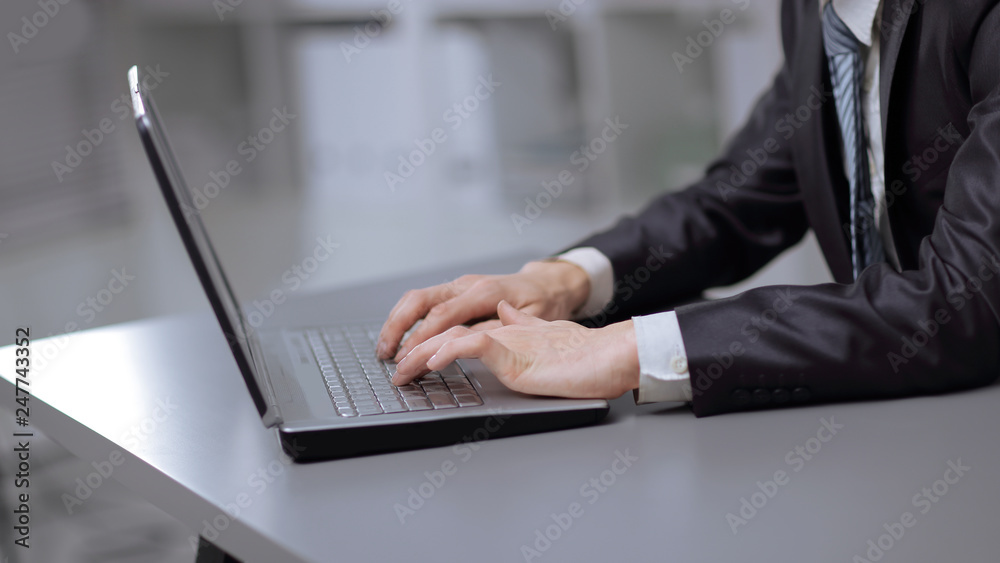 close up. businessman typing on laptop. people and technology close up. businessman typing on laptop. people and technology