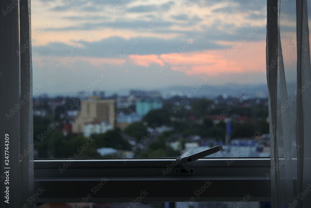 Glass Window With Sunset Sky In The City View Outside The Room Stock Photo Adobe Stock