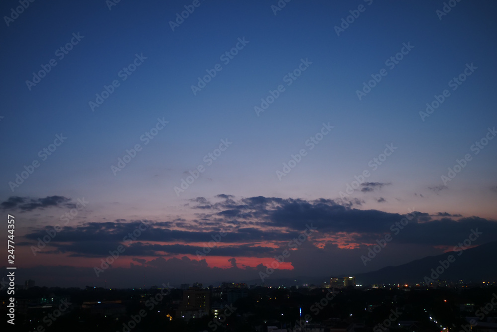 dramatic dusk sky above the city skyline