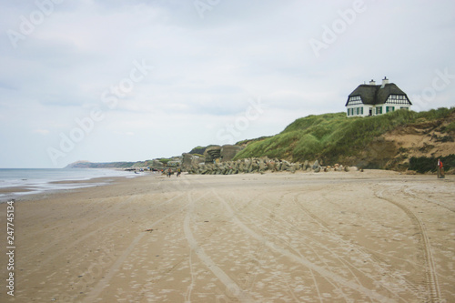 a house on top the dunes with a epic view to the beach