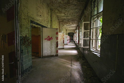 an old floor with open doors and windows in an abandoned places