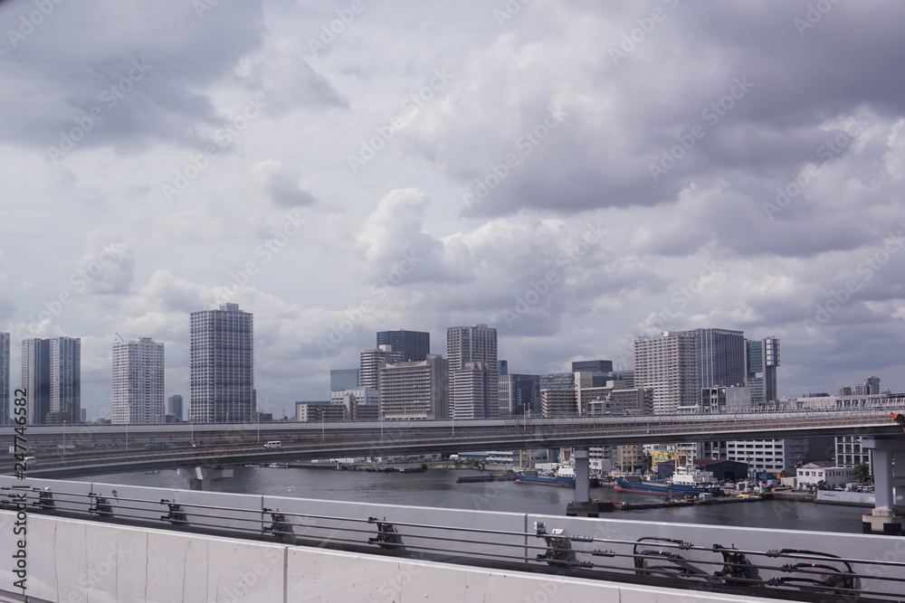 Scenery of a train traveling on the elevated rail of Yurikamome Line in Tokyo