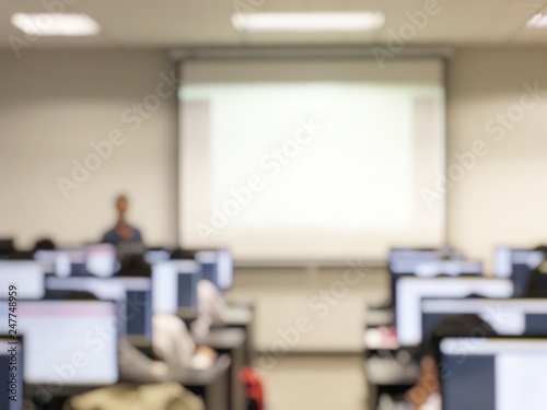Photography Blurred image of group of students are learning and lecture and using computer together in classroom for study and workshop in computers room at school