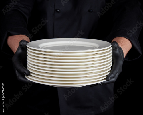 stack of round white empty plates
