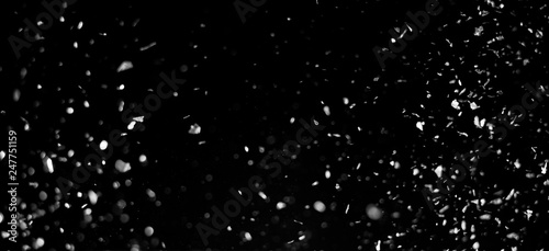 Obraz na plátne Particles overlay on black background.