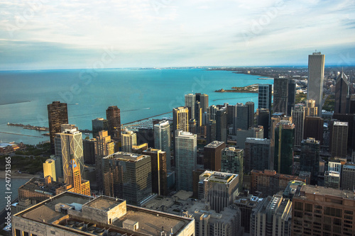 Chicago downtown aerial view at dusk with skyscrapers and city skyline at Michigan lakefront.