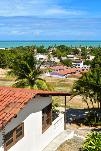 Ilha de Itamaraca, Brazil - Circa December 2018: A view of Itamaraca island from a hill - atlantic ocean in the background photo