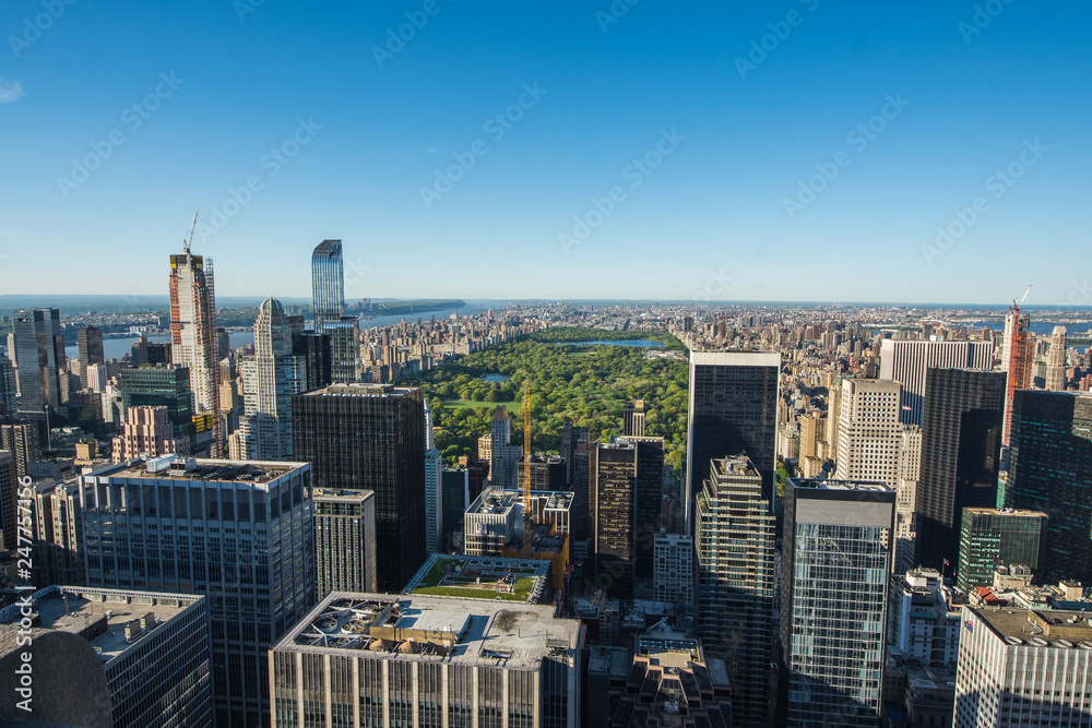 Fototapeta premium Aerial view of Central Park and Times Square, New York CIty at sunset. Landscape of NYC