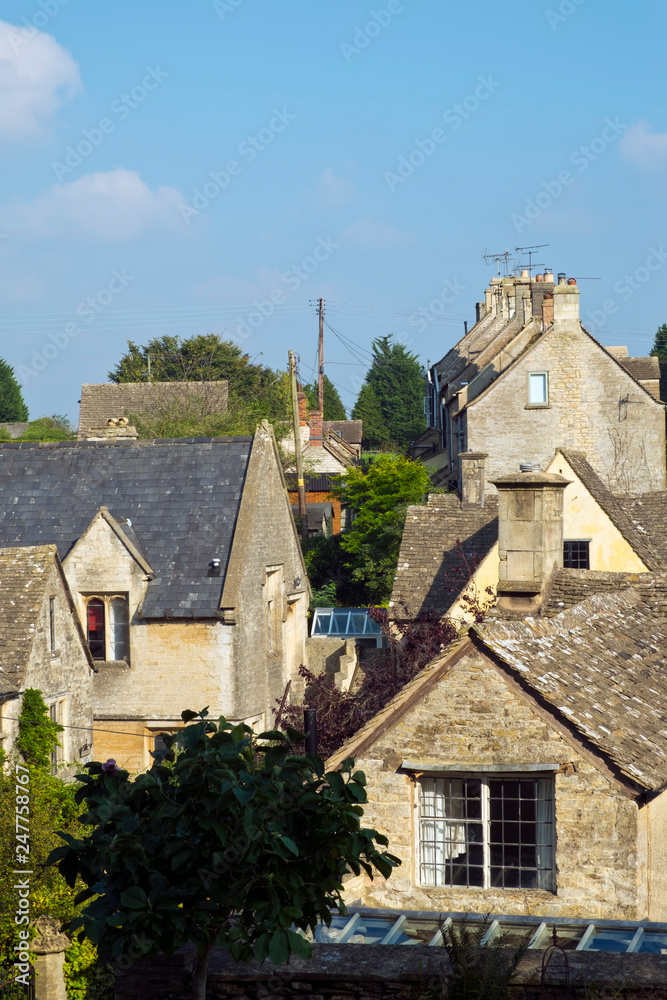 Higgledy-piggledy rooftops in quaint Bisley village, The Cotswolds, Gloucestershire, UK