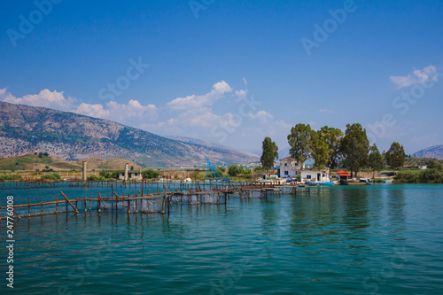 Lake view in Butrint - Buthrotum. Touristic historical attraction. Summer in Albania. photo