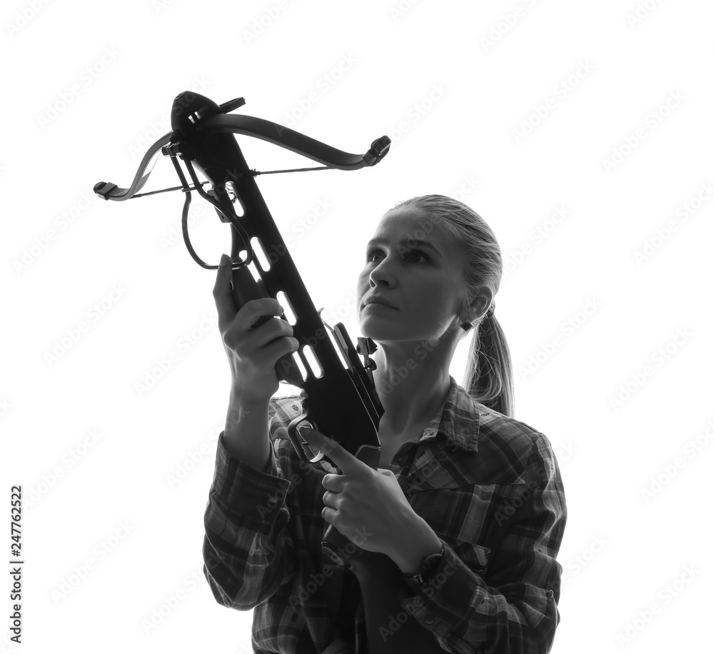 Portrait of beautiful woman with crossbow on white background Portrait of beautiful woman with crossbow on white background