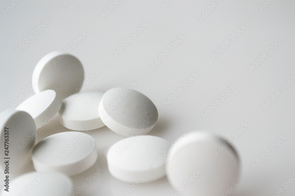 white pills close up white pills close up