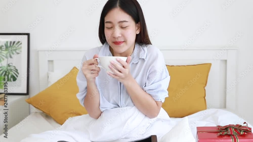 Young woman having breakfast in bed. Young woman having breakfast in bed.