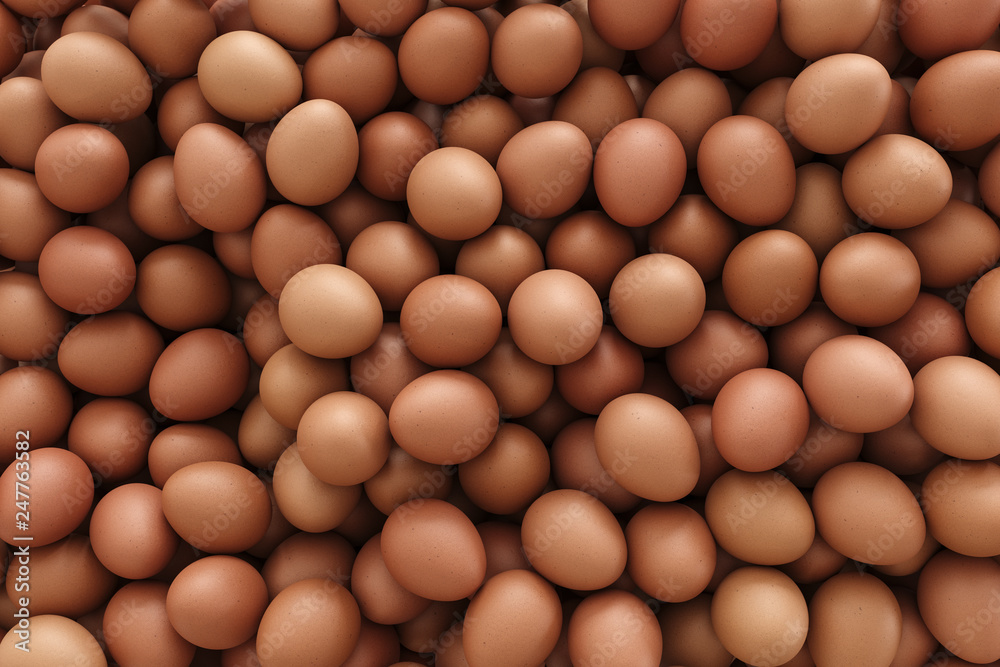 Pile of brown eggs fills the frame without background Pile of brown eggs fills the frame without background