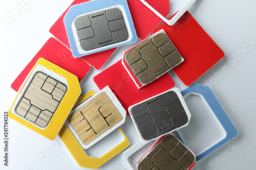 Different sim cards on white background photo