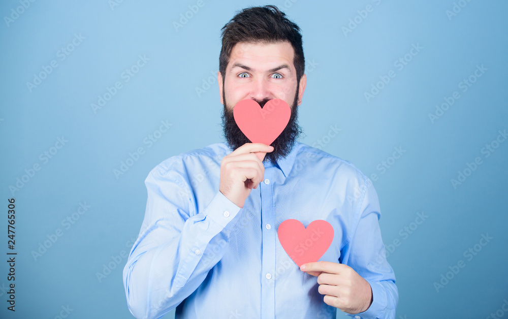 Man bearded hipster with heart valentine card. Celebrate love. Guy with beard and mustache in romantic mood. Feeling love. Dating and relations concept. Happy in love. Send kiss to you. Sweet kiss Man bearded hipster with heart valentine card. Celebrate love. Guy with beard and mustache in romantic mood. Feeling love. Dating and relations concept. Happy in love. Send kiss to you. Sweet kiss