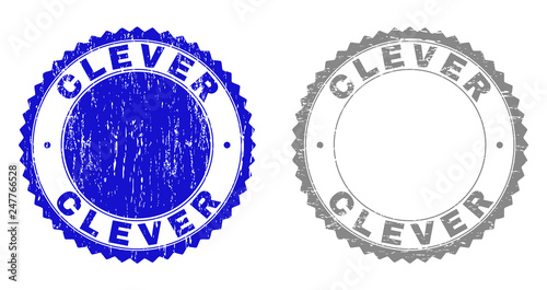 Grunge CLEVER stamp seals isolated on a white background. Rosette seals with grunge texture in blue and gray colors. Vector rubber stamp imitation of CLEVER text inside round rosette.