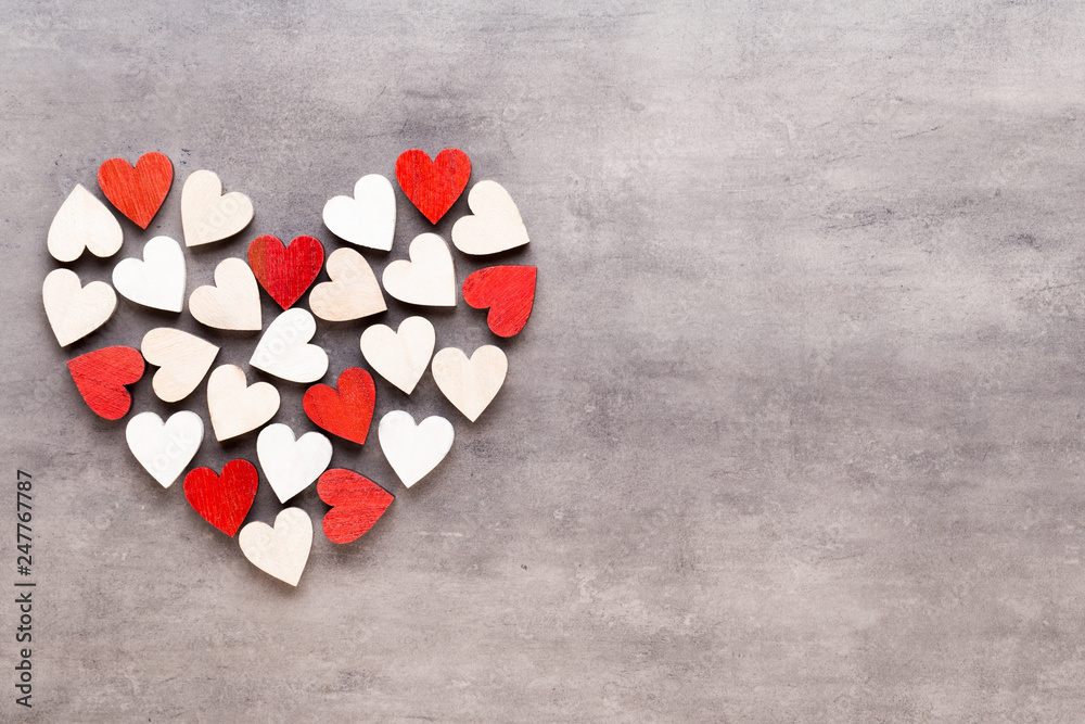 Obraz premium Happy Valentines day background. With small hearts on gray background.