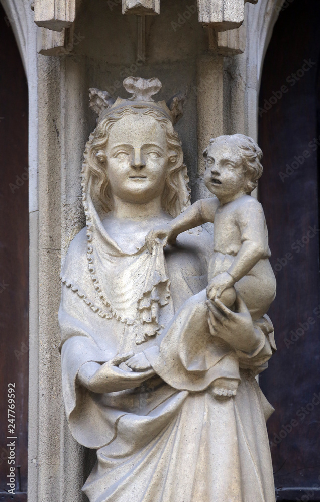 Virgin Mary statue from west portal of Minoriten gothic church in Vienna