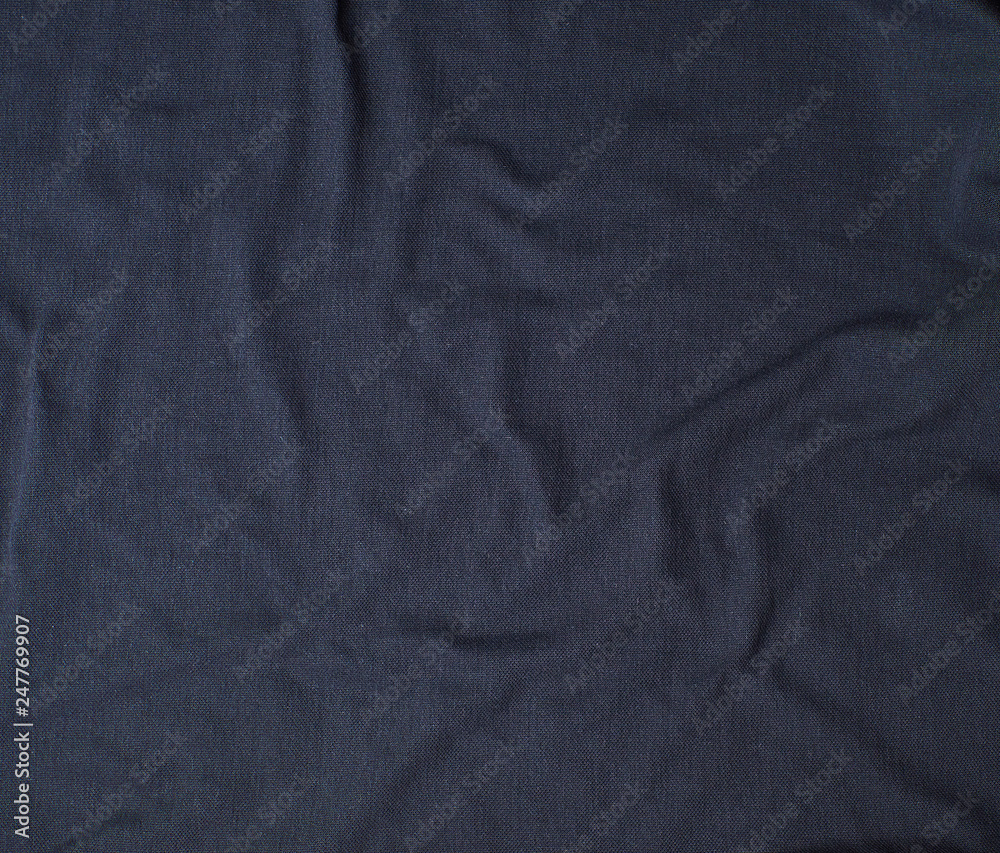 fragment of crumpled cotton black fabric fragment of crumpled cotton black fabric