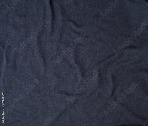 fragment of crumpled cotton black fabric