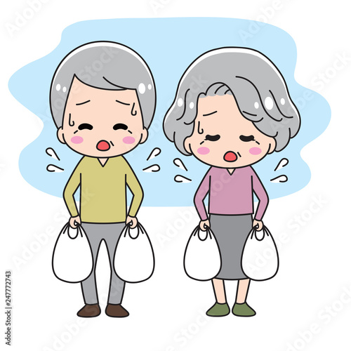 Old people with heavy shopping bags